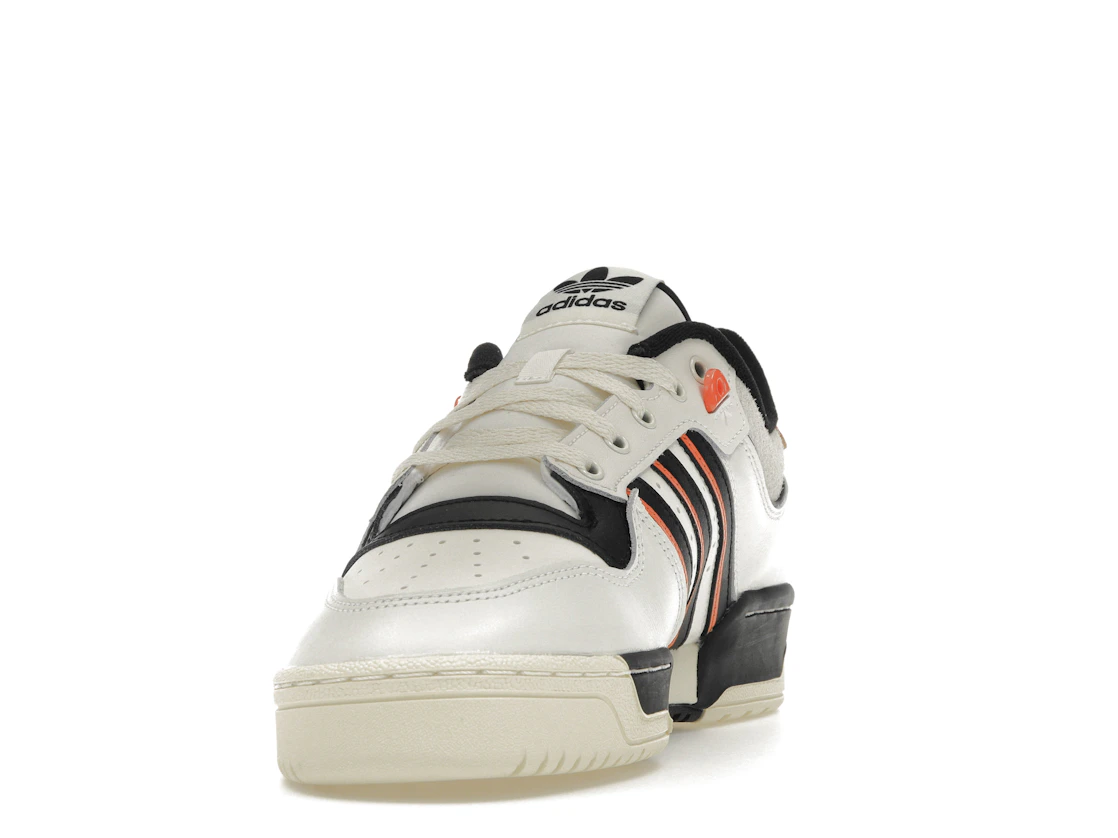 Vue 12 de adidas Rivalry 86 Low White Black Semi Impact Orange