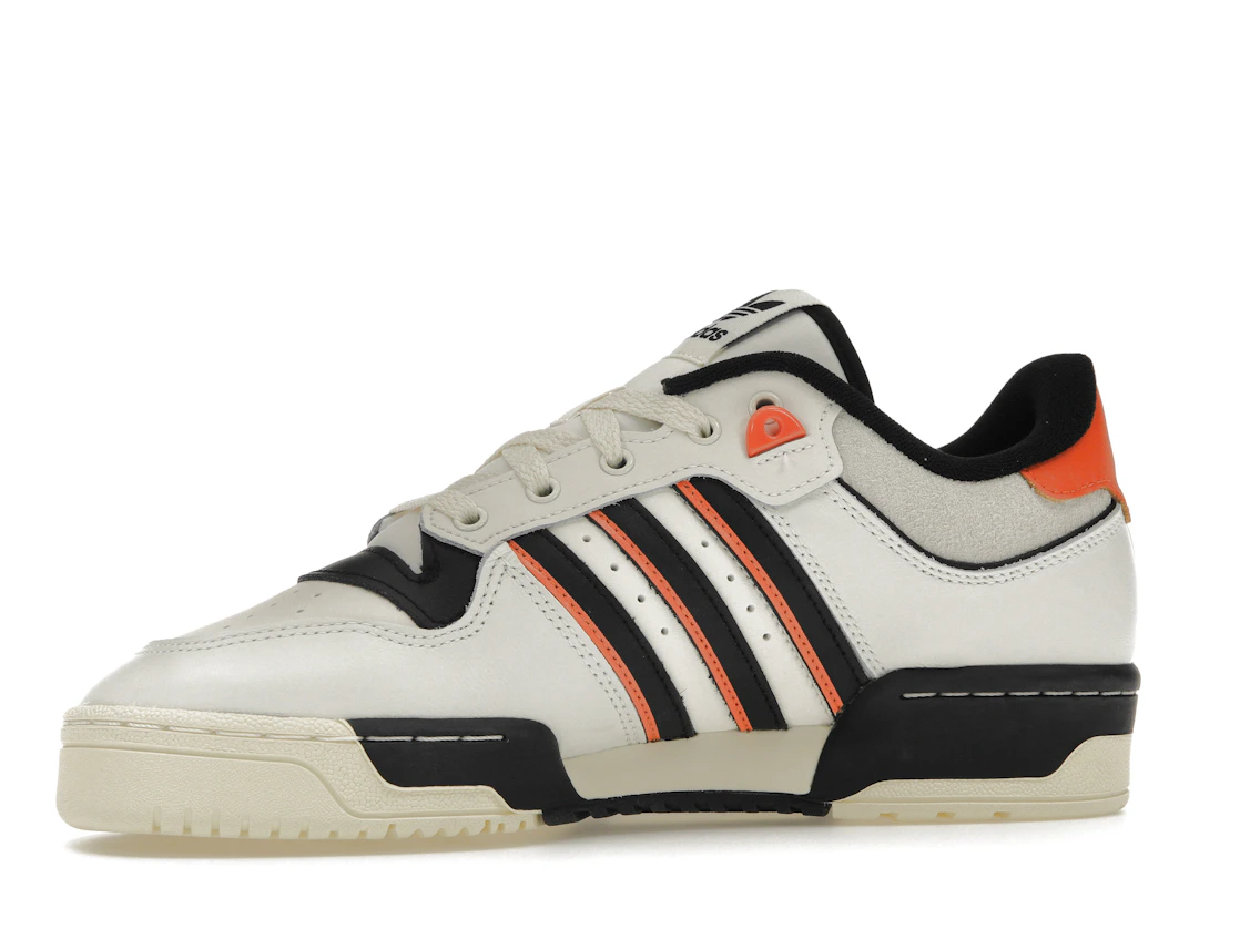 Vue 17 de adidas Rivalry 86 Low White Black Semi Impact Orange