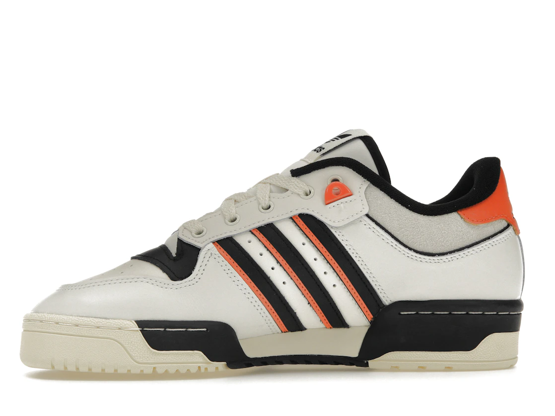 Vue 18 de adidas Rivalry 86 Low White Black Semi Impact Orange