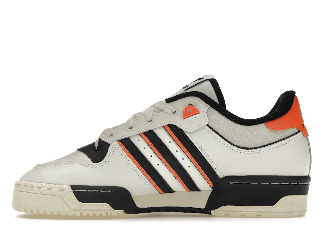 Vue 19 de adidas Rivalry 86 Low White Black Semi Impact Orange