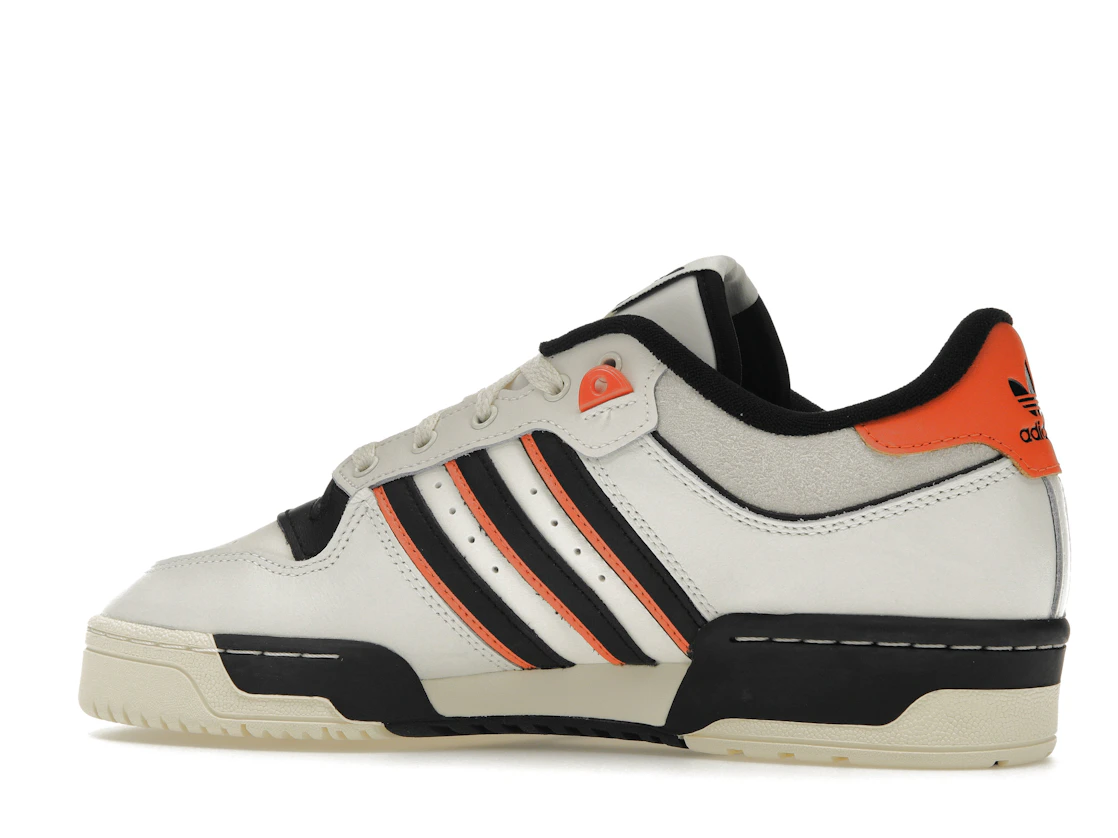 Vue 21 de adidas Rivalry 86 Low White Black Semi Impact Orange