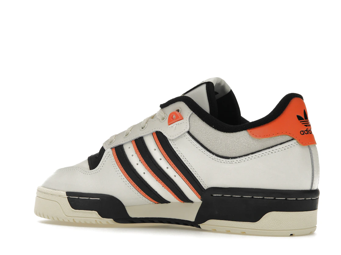 Vue 22 de adidas Rivalry 86 Low White Black Semi Impact Orange
