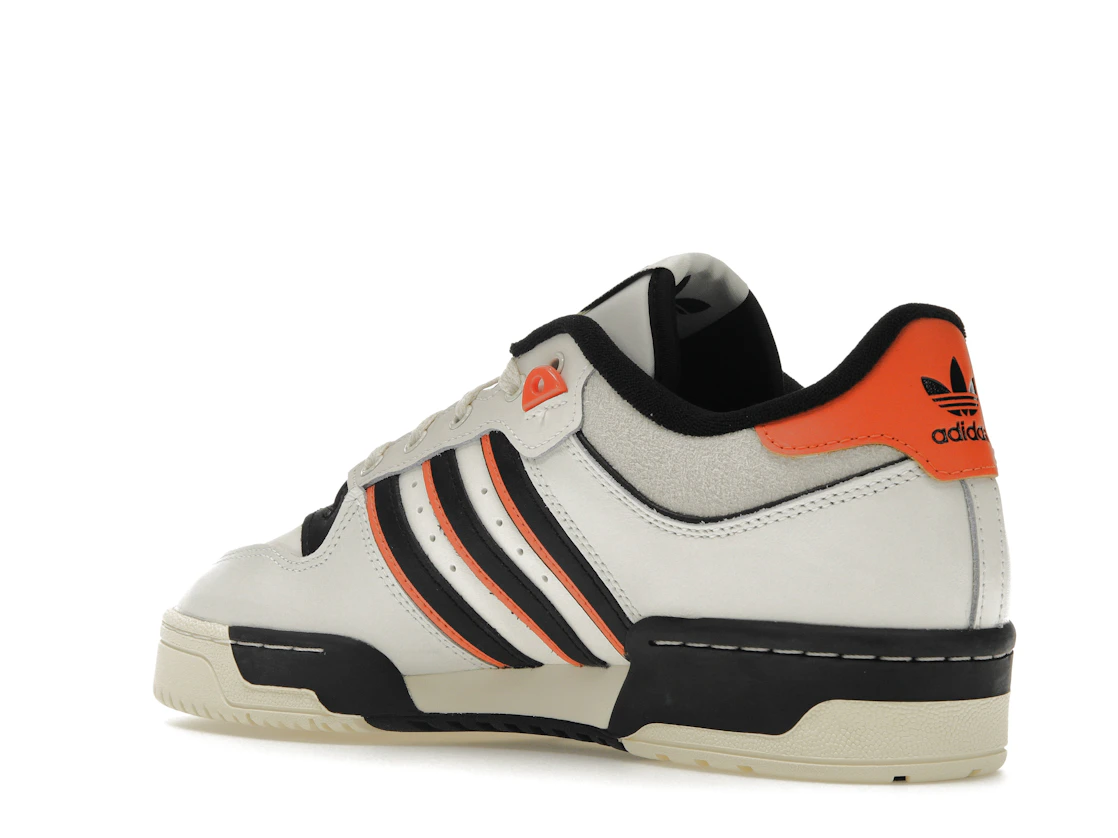 Vue 23 de adidas Rivalry 86 Low White Black Semi Impact Orange