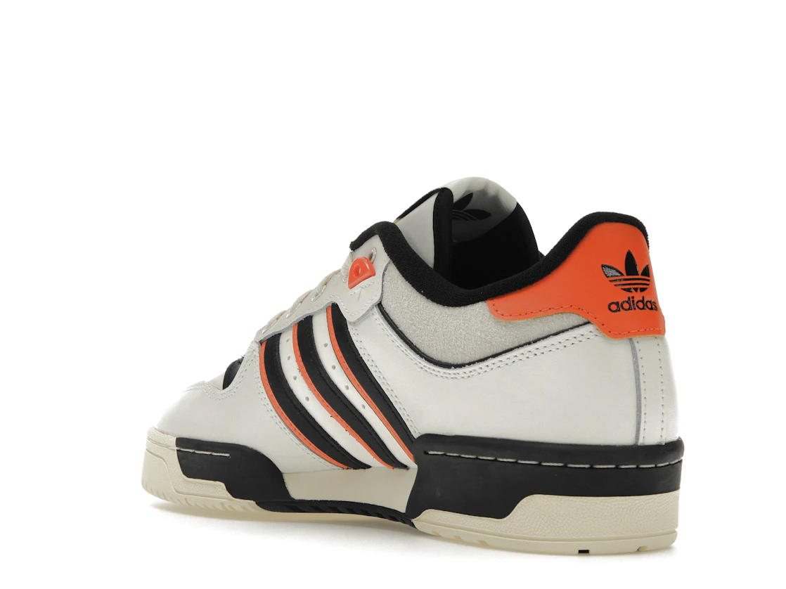 Vue 24 de adidas Rivalry 86 Low White Black Semi Impact Orange